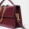 Duża torebka Bambino Cross-body z metalową klapką