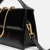 Duża torebka Bambino Cross-body z metalową klapką