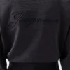 Haftowany sweter Haftowany sweter z dzianiny